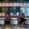 Resident Lounge with Woman on Laptop