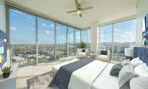 Furnished bedroom with floor to ceiling windows with beautiful view of green hills