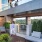 Large outdoor lounge area located adjacent to the pool with plenty of seating 
