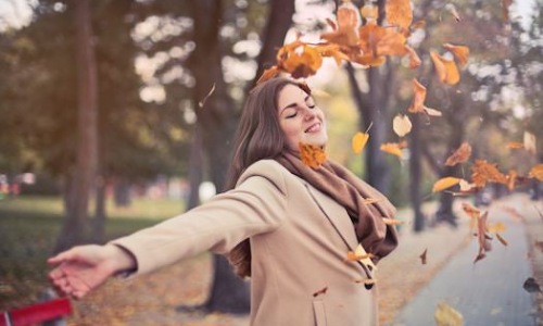 Woman enjoying fall weather