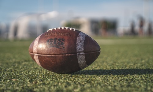 Football sitting on a field